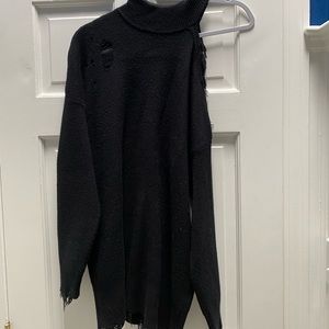 Ripped open shoulder sweater